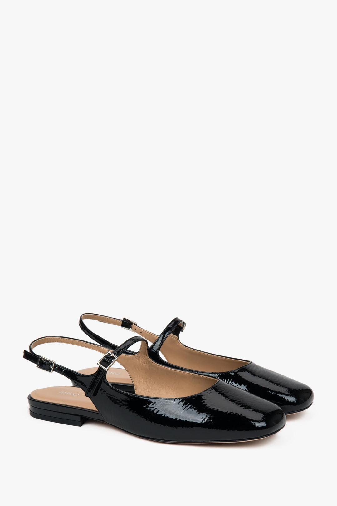 Black patent leather slingback flats for women by Estro.