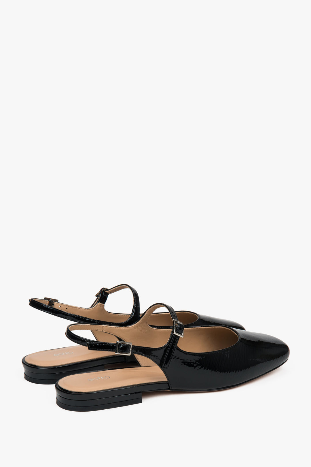 Women's black patent slingback shoes by Estro.