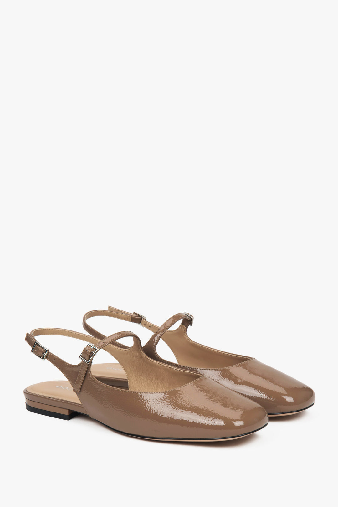 Women's brown patent leather slingback flats by Estro.