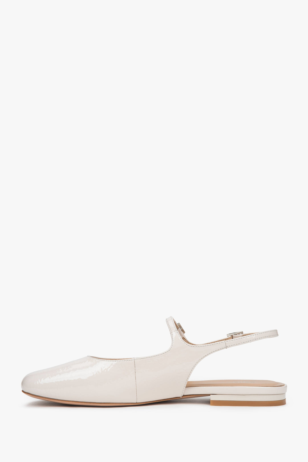 Light beige patent leather slingback flats for women.