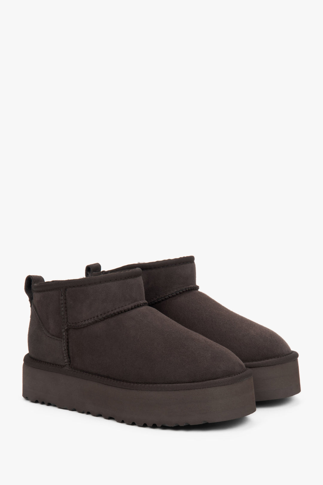 Low brown women's snow boots made of genuine velour with fur.