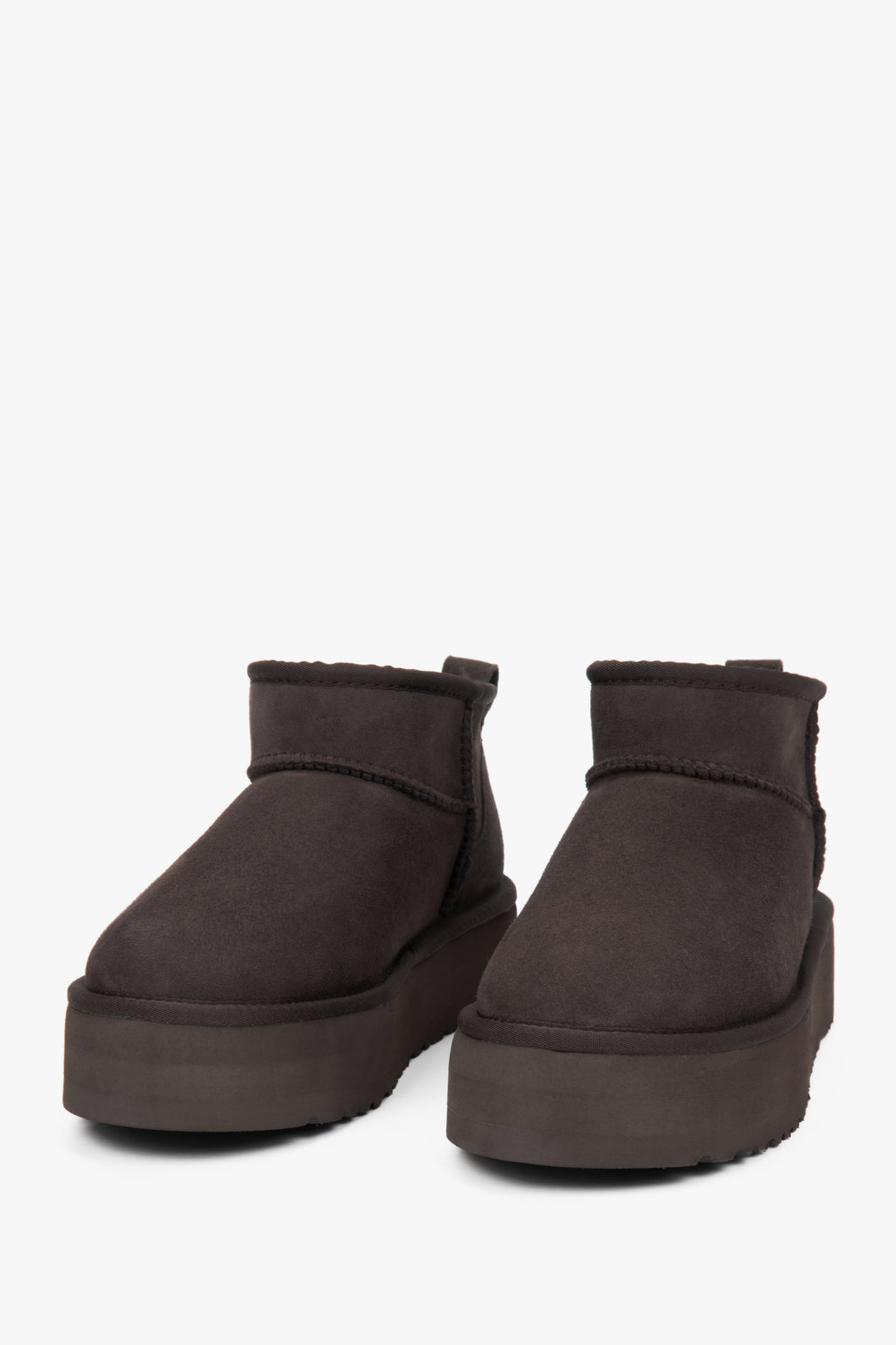 Low women's snow boots by Estro, made of brown genuine velour with a warm fur lining.