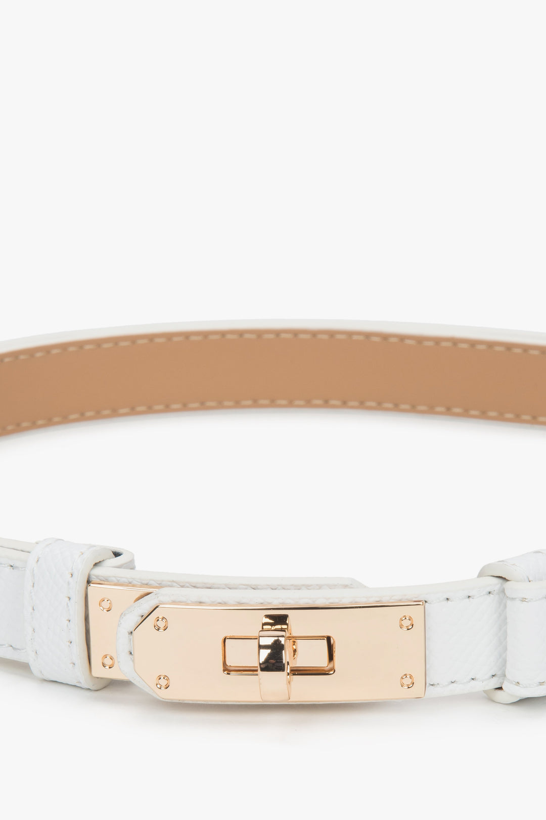 Women's white leather belt with a gold buckle.