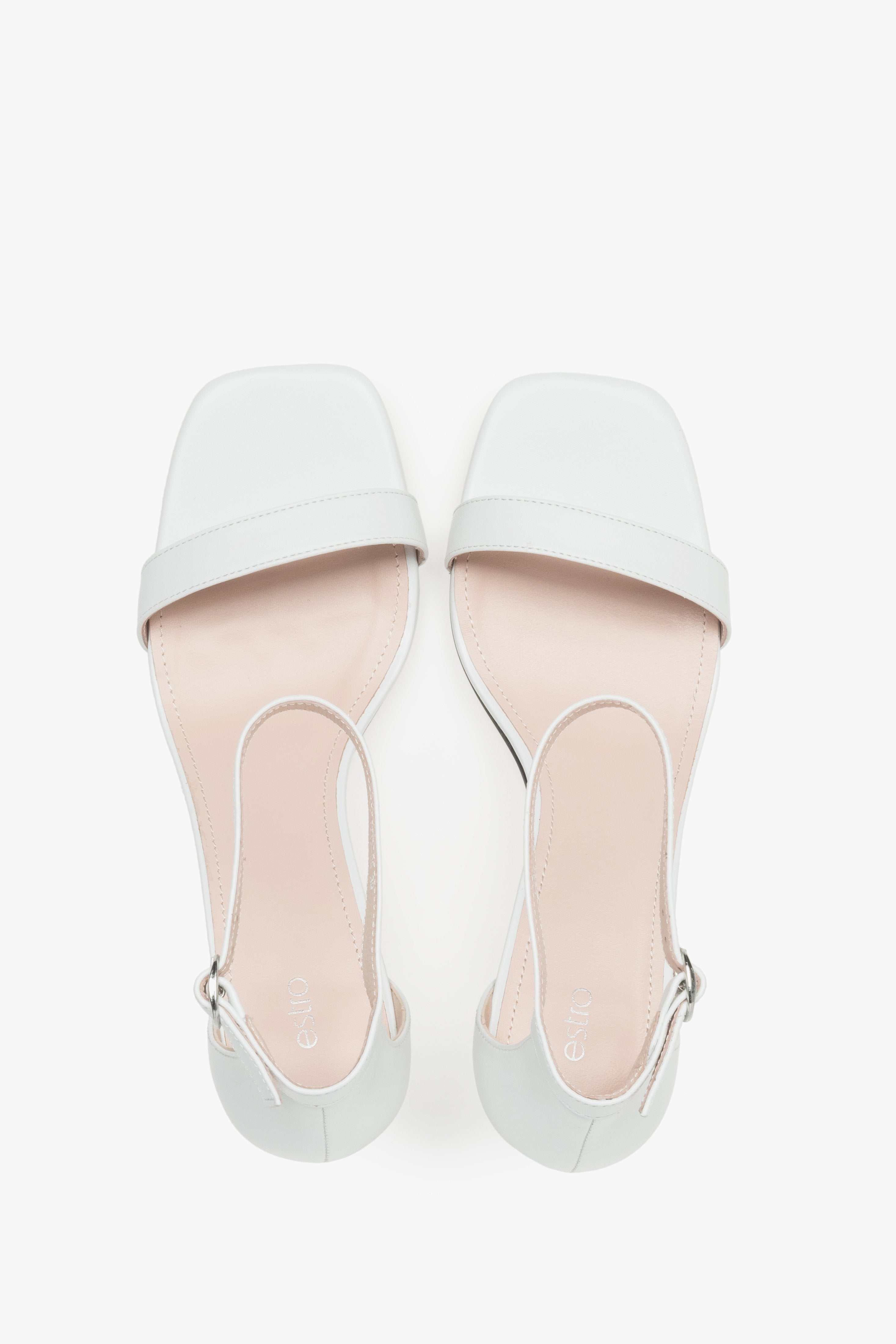 Sophisticated women's white sandals by Estro, crafted genuine leather, and finished with a modern funnel heel.