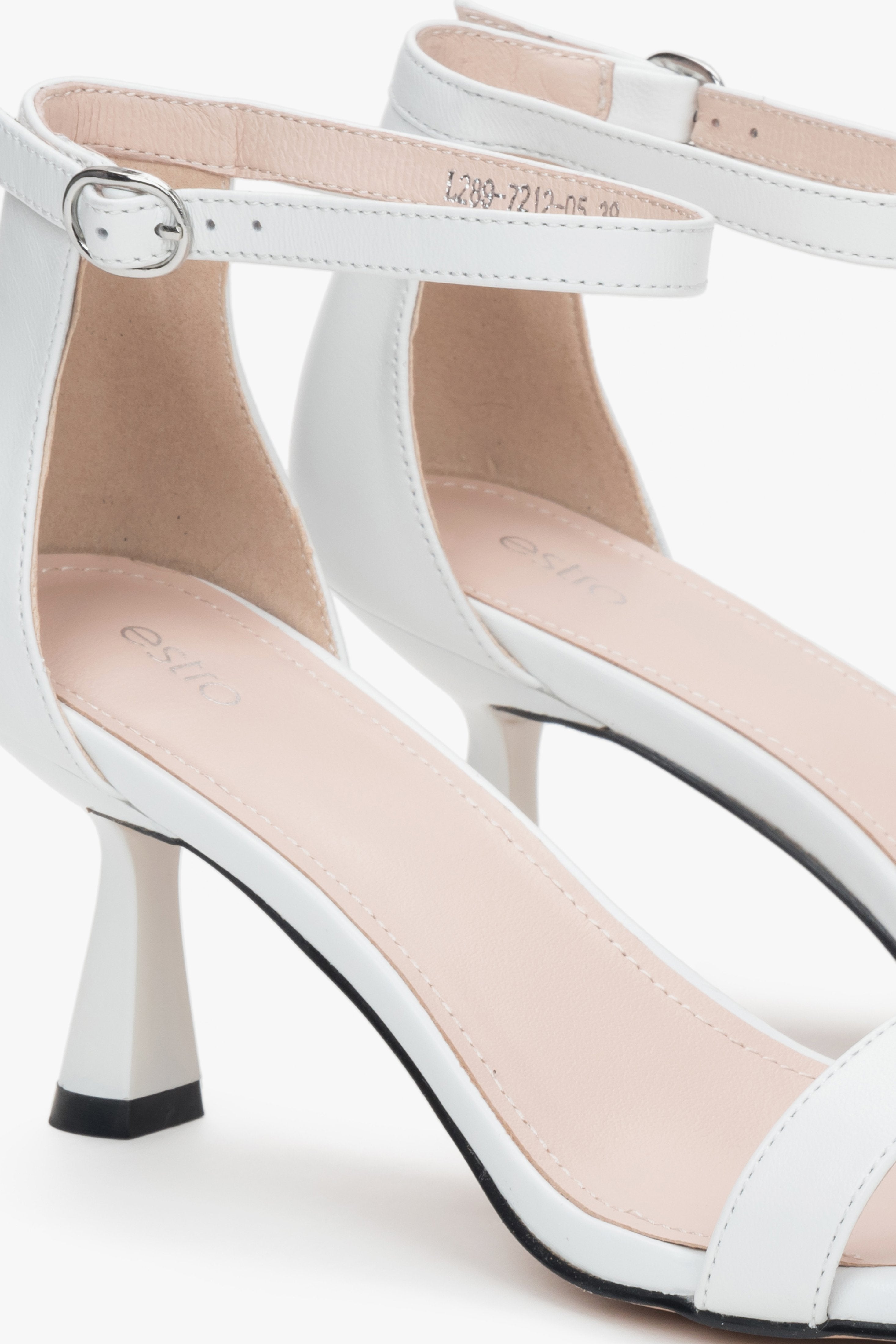 White leather sandals by Estro, with a sturdy and supportive funnel heel.