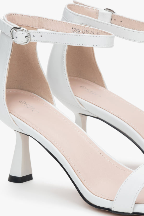 White leather sandals by Estro, with a sturdy and supportive funnel heel.