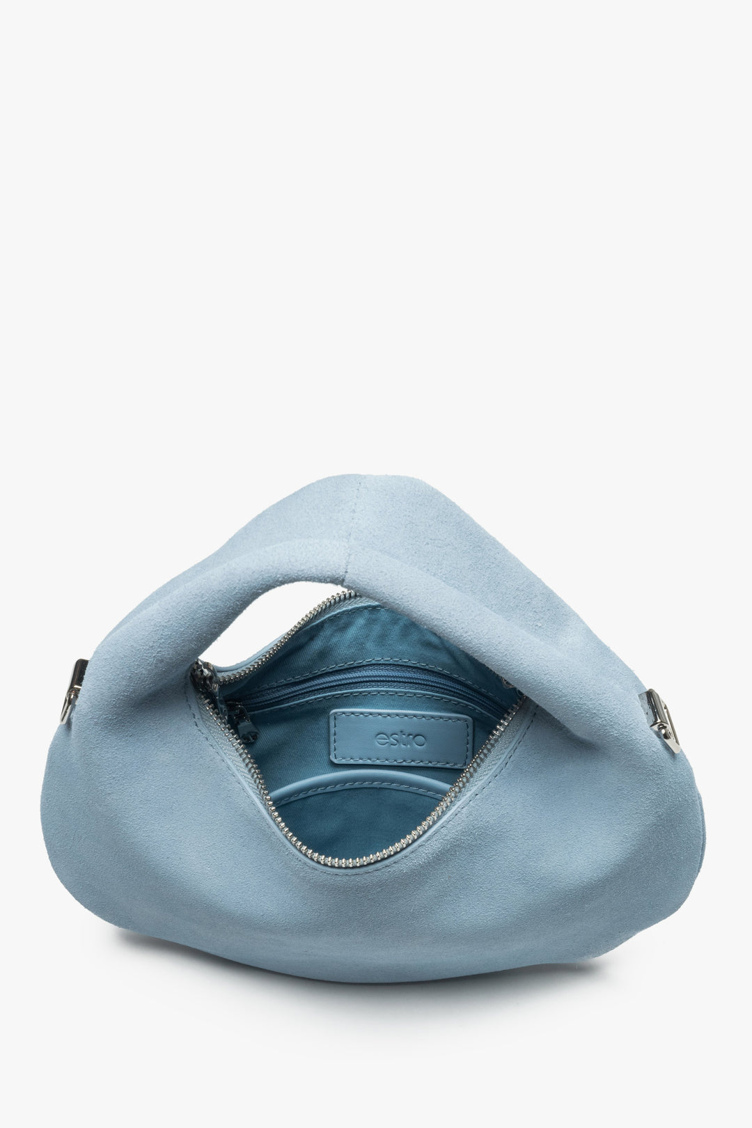 Women's hand handbag made of genuine velour in a blue shade.