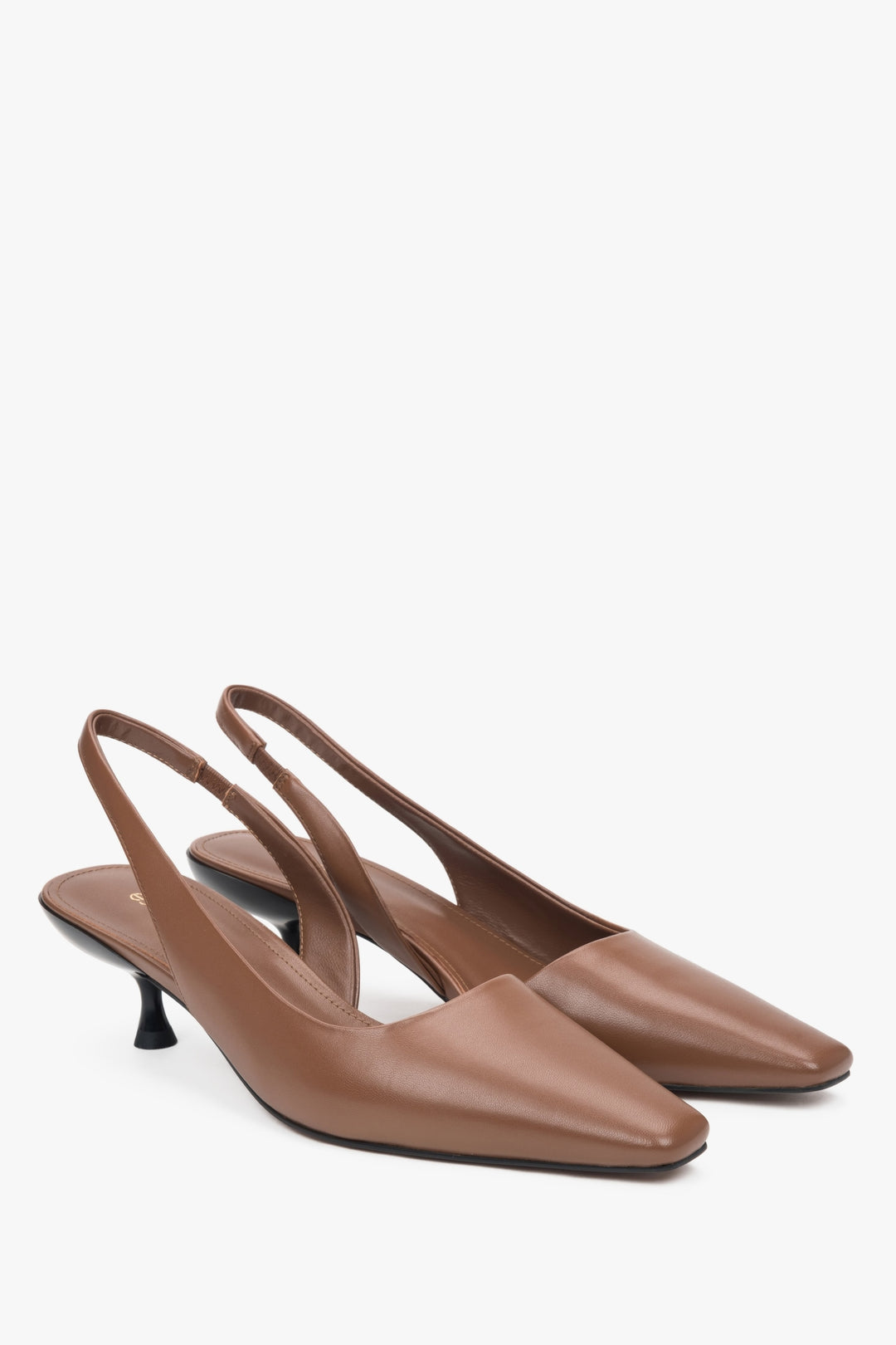 Women's brown slingback pumps made of soft, perforated natural velour by Estro.