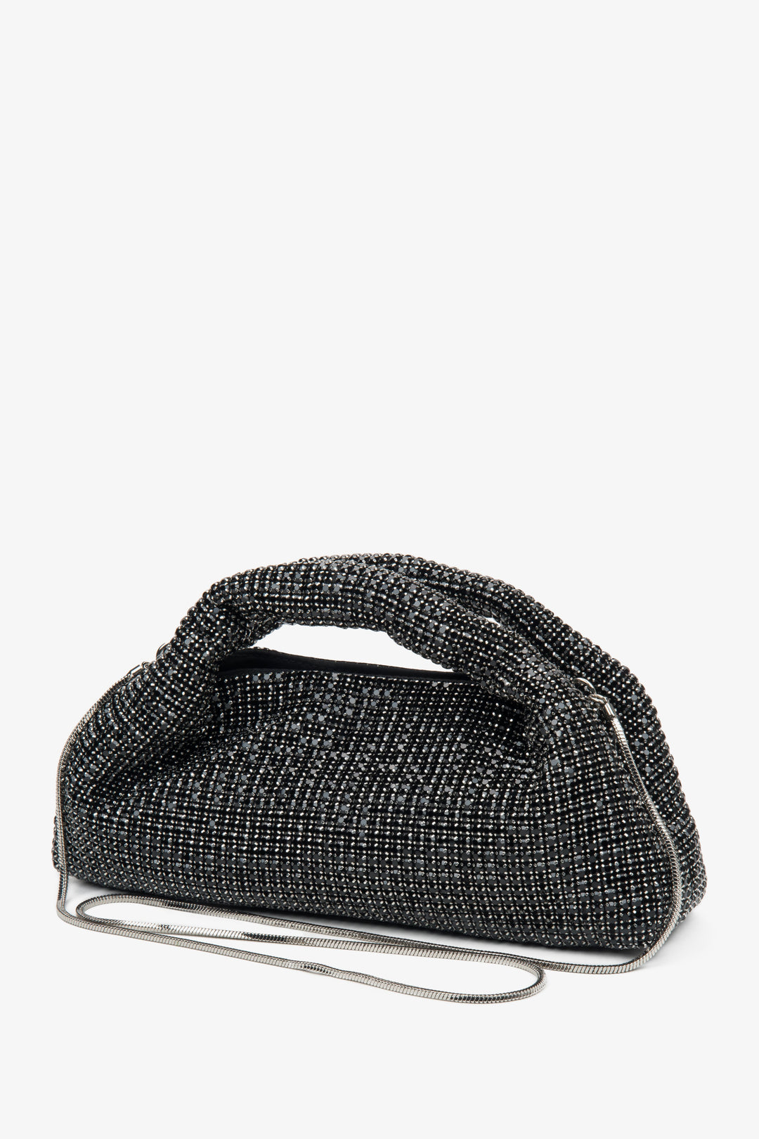 Black evening bag by Estro, adorned with sparkling crystals, featuring a unique textured handle.