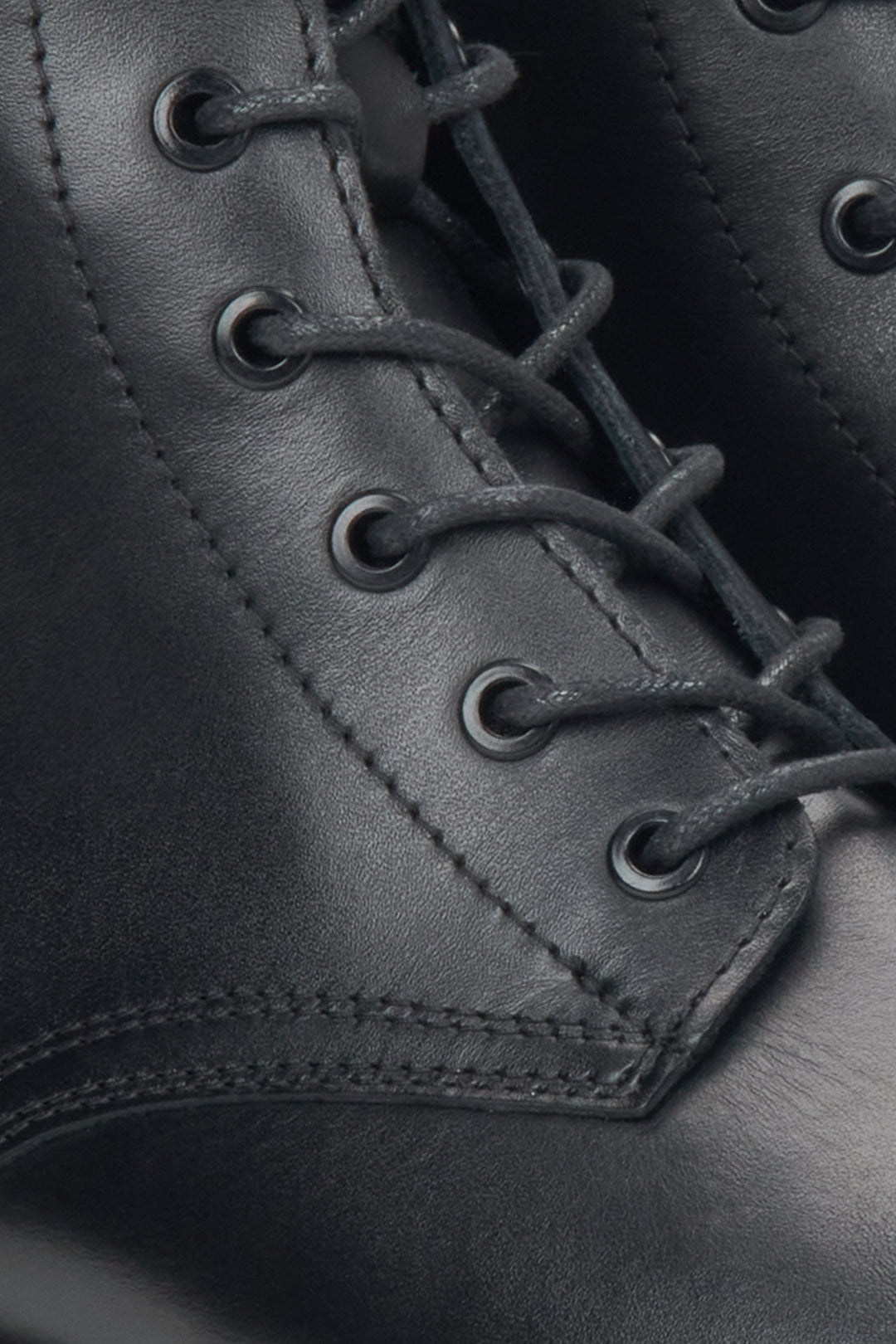 Women's black leather ankle boots by Estro - close-up of the details.