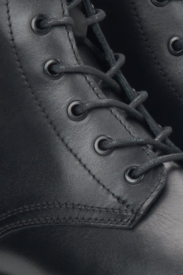 Women's black leather ankle boots by Estro - close-up of the details.