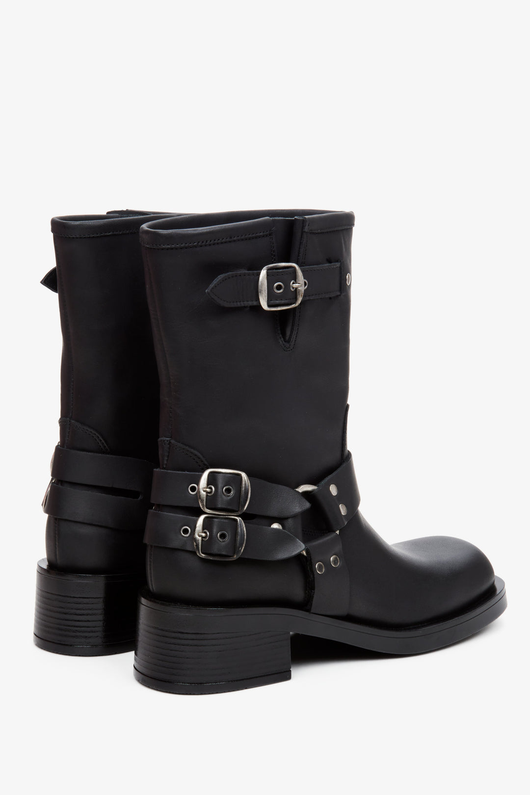 Women's leather boots with jet embellishments by Estro - close-up on the heel and side line of the boots.