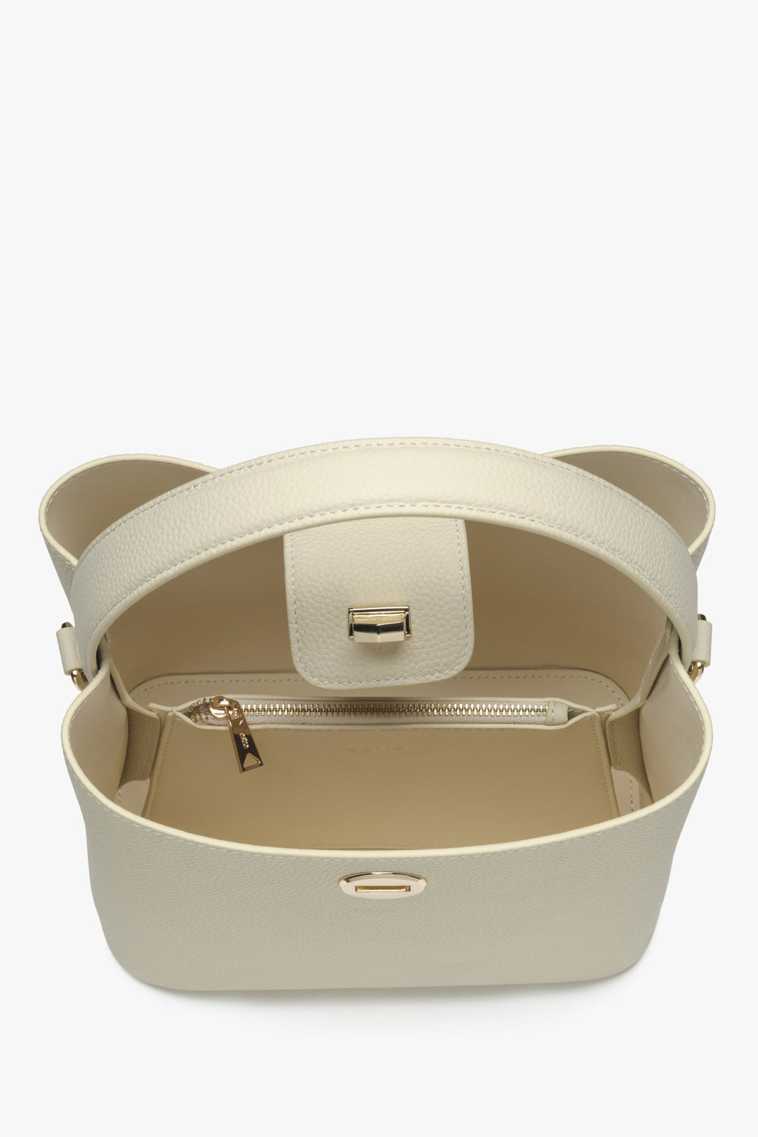 Women's light beige leather handbag - close-up of the interior.