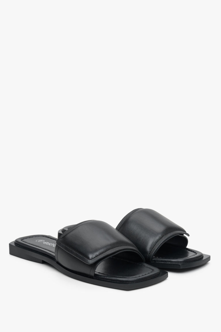 Genuine leather flat mules in black.