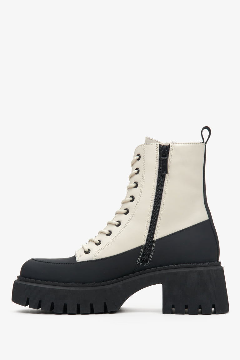 Women's leather beige and black Estro  ankle boots with a zipper - shoe profile.