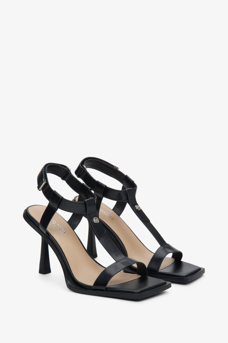T-Bar black strappy sandals on a high heel Estro - a close-up on shoe profile.