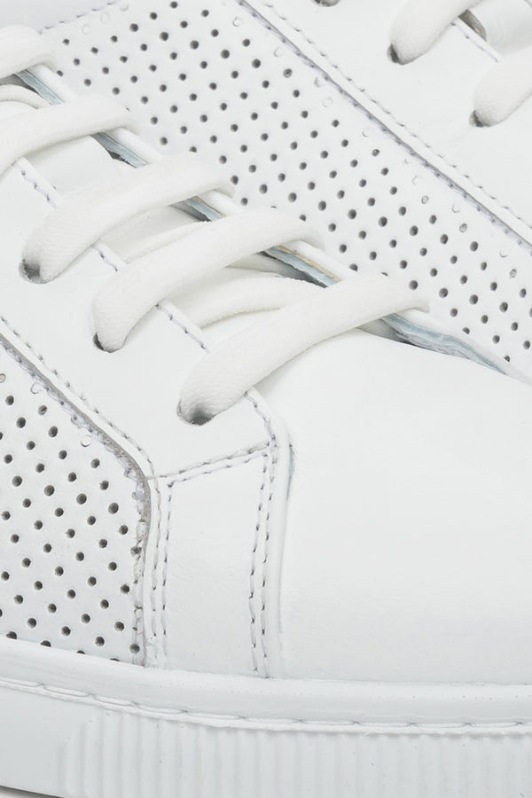 Women's white summer sneakers - close-up on the details.