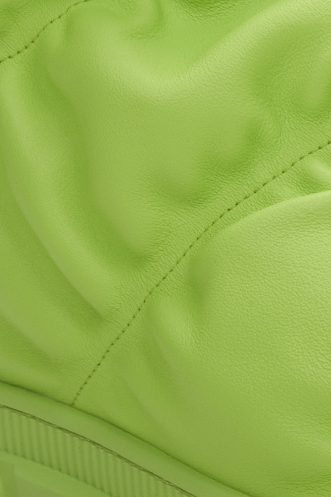 Green fur lined snow boots Estro - a close-up on details.