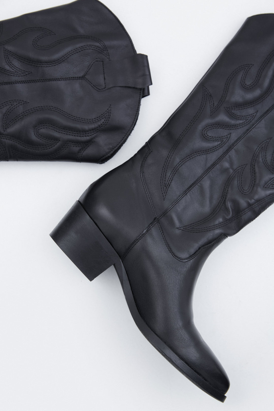 Black leather women's cowboy boots by Estro.