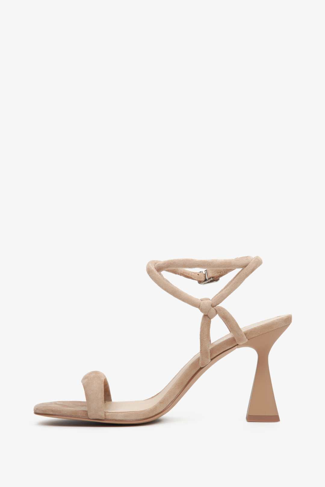 Women's beige strappy sandals on a funnel heel - shoe profile.