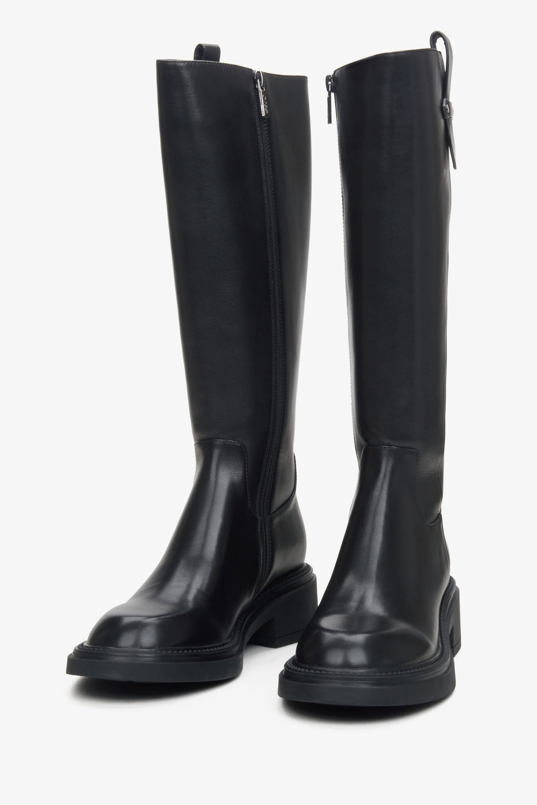Women's boots made of genuine leather with a wide shaft by Estro - front presentation.