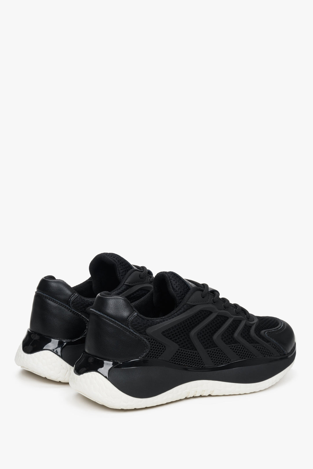 Women's black sneakers with a chunky white sole by ES 8.