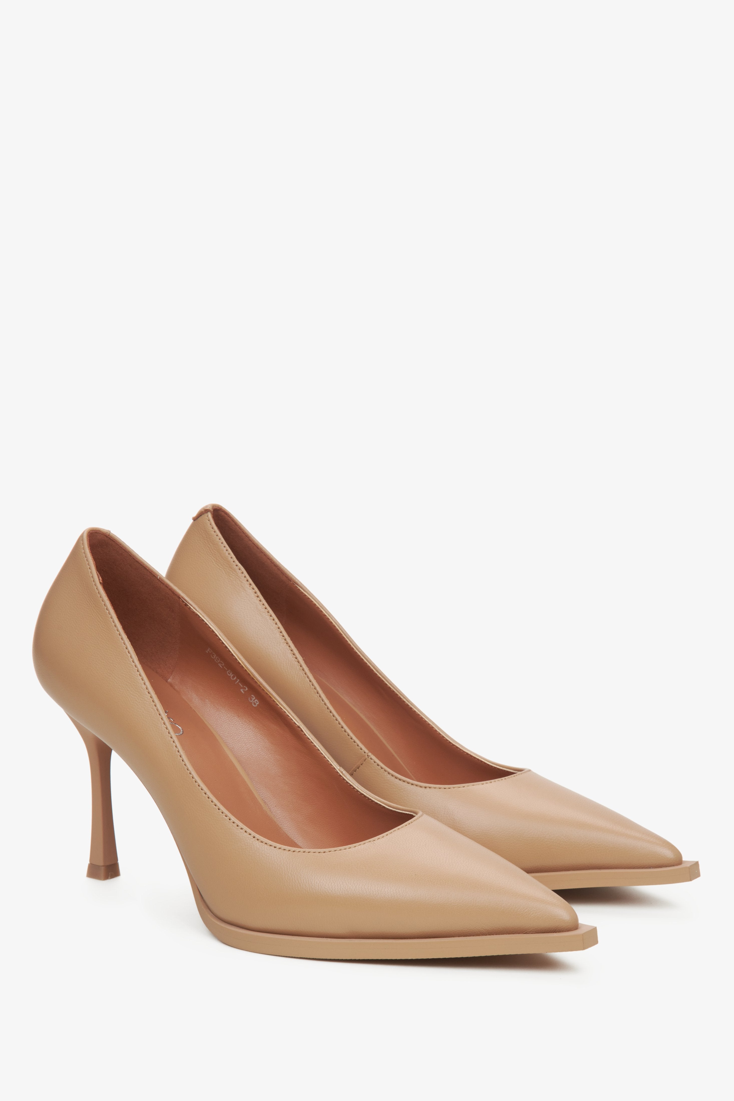 Estro women's beige leather stiletto pumps.