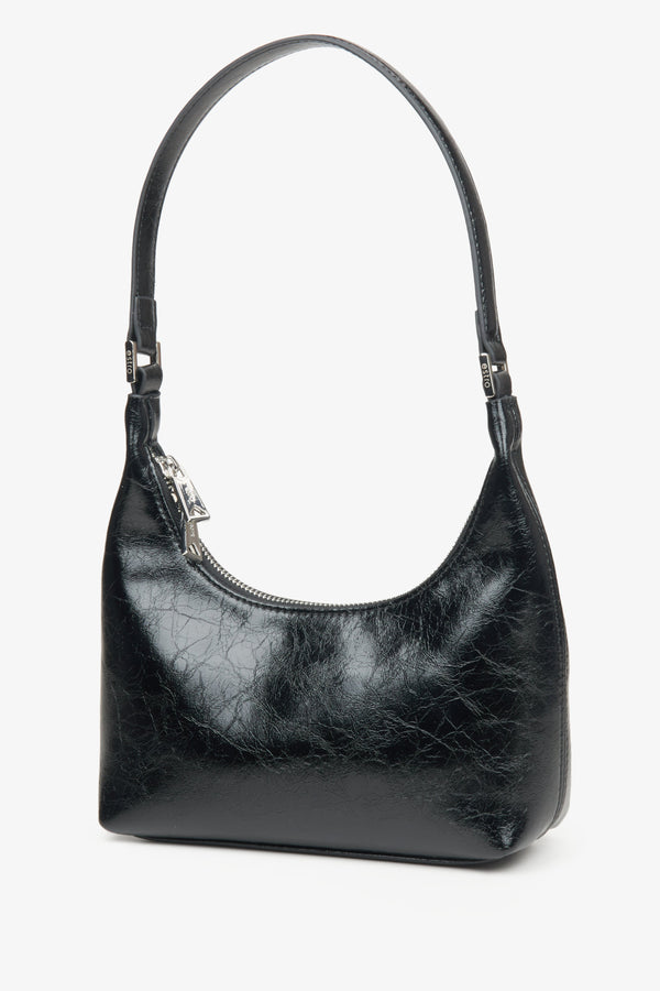 Women's black handbag - a close-up on details.