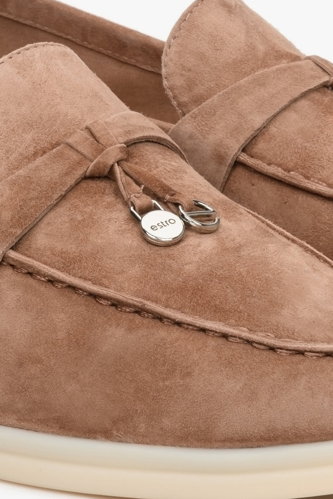 Brown comfy and elegant women's velour loafers - close-up on details.