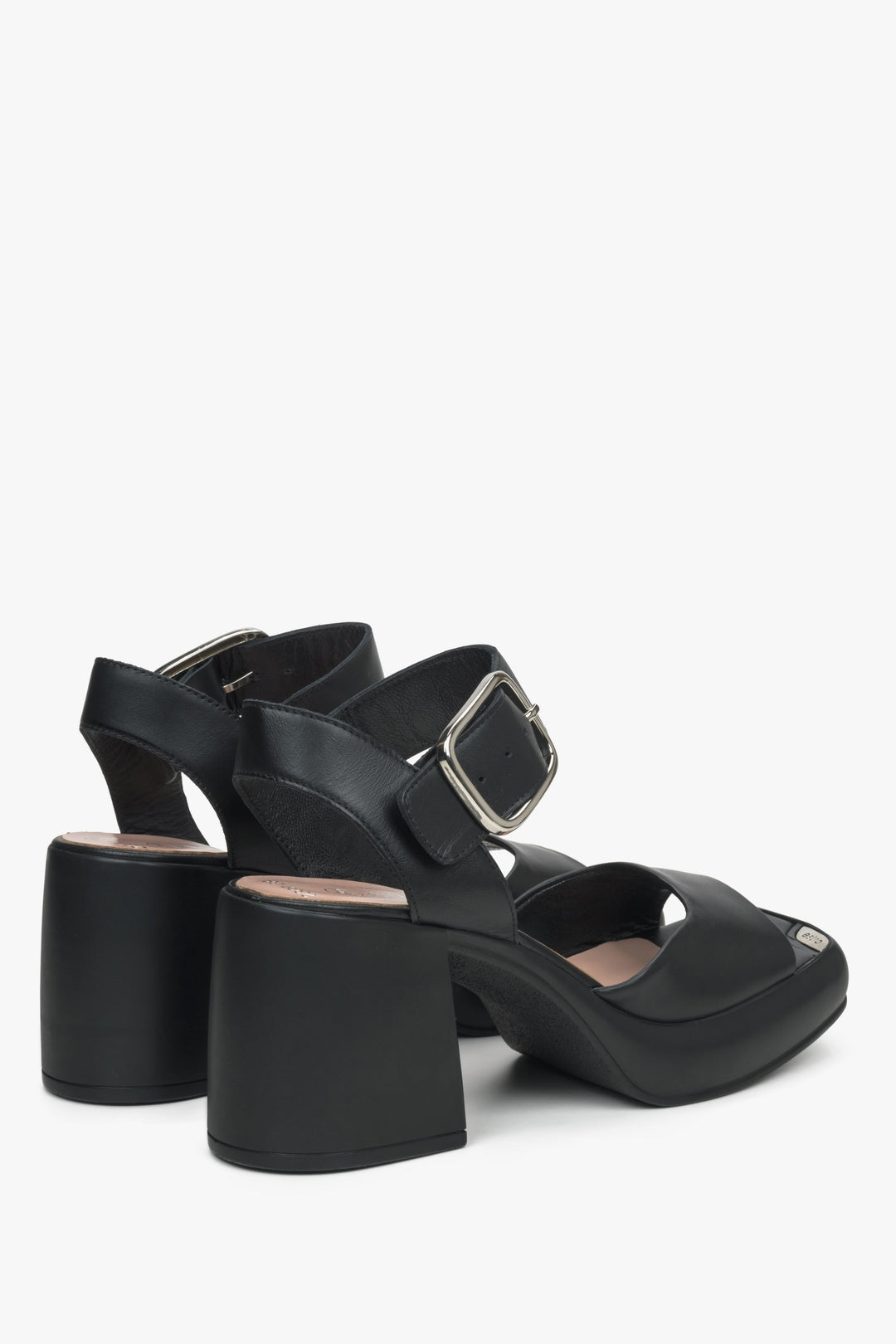 Women's black leather sandals by Estro - close-up of the heel and side profile of the shoe.