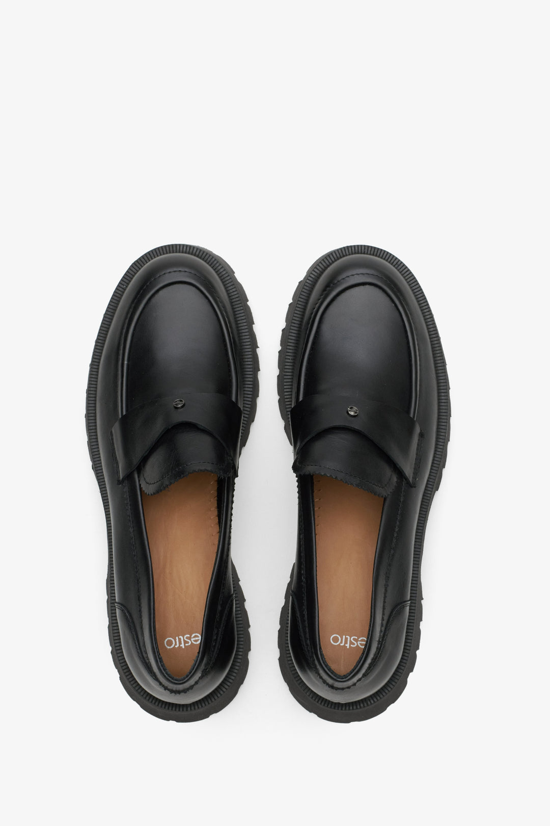 Women's black leather loafers by Estro.