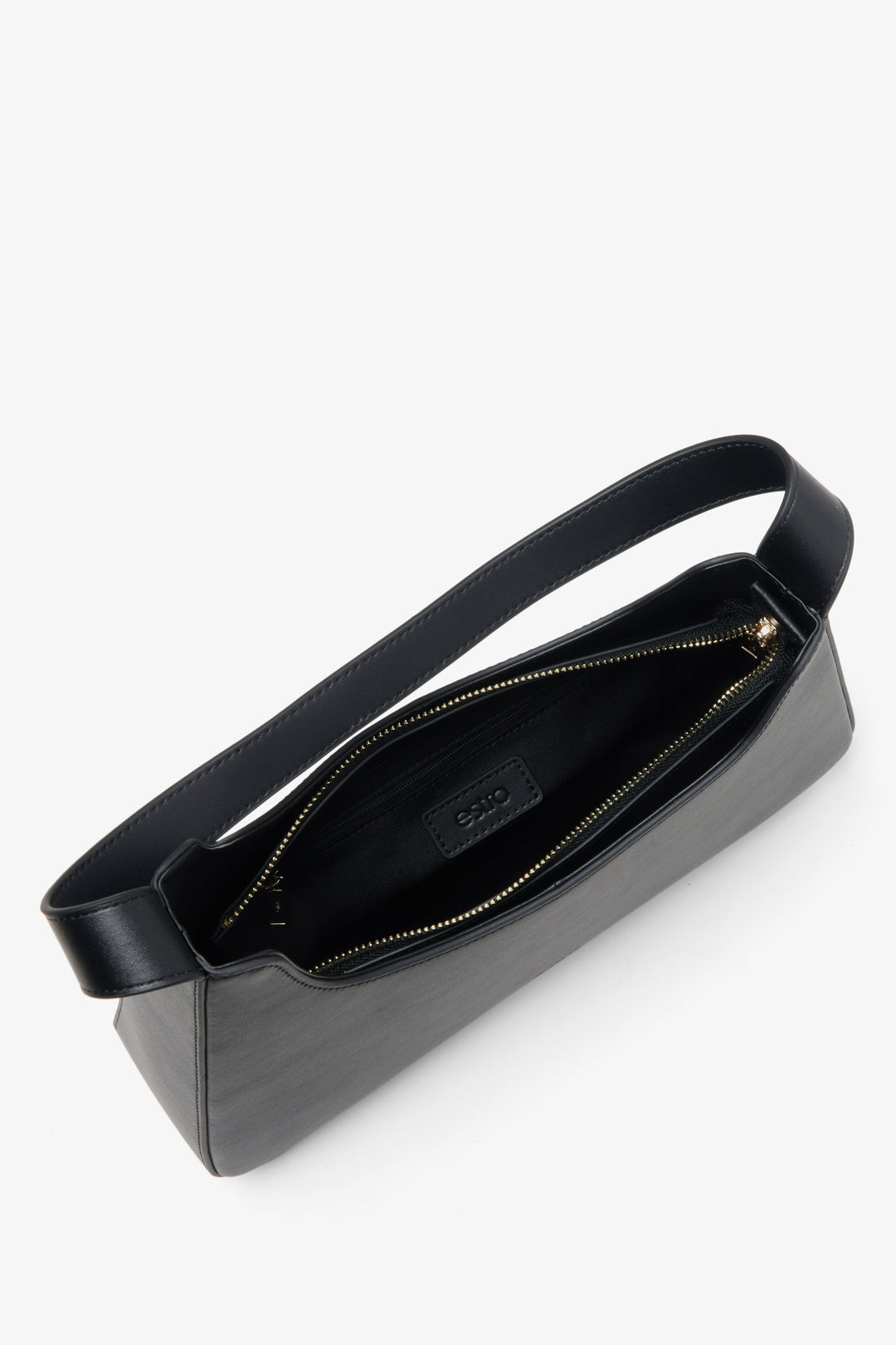 Black leather handbag Estro - a close-up on bag's compartment.