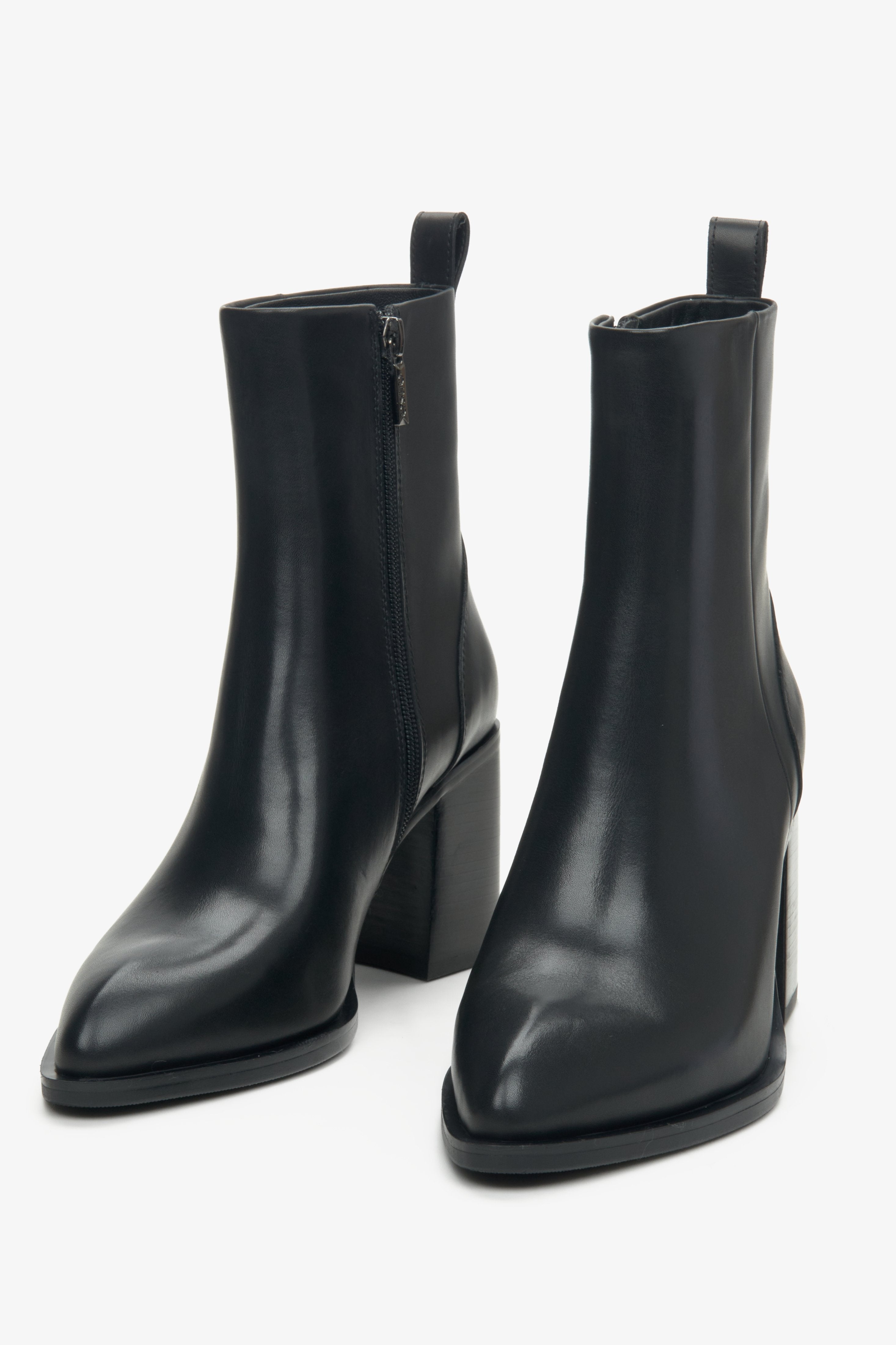 Women's black  leather ankle boots with a pointed toe by Estro - front view of the shoes.