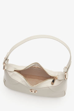 Elegant women's cream beige bag - a close-up on the main compartment.