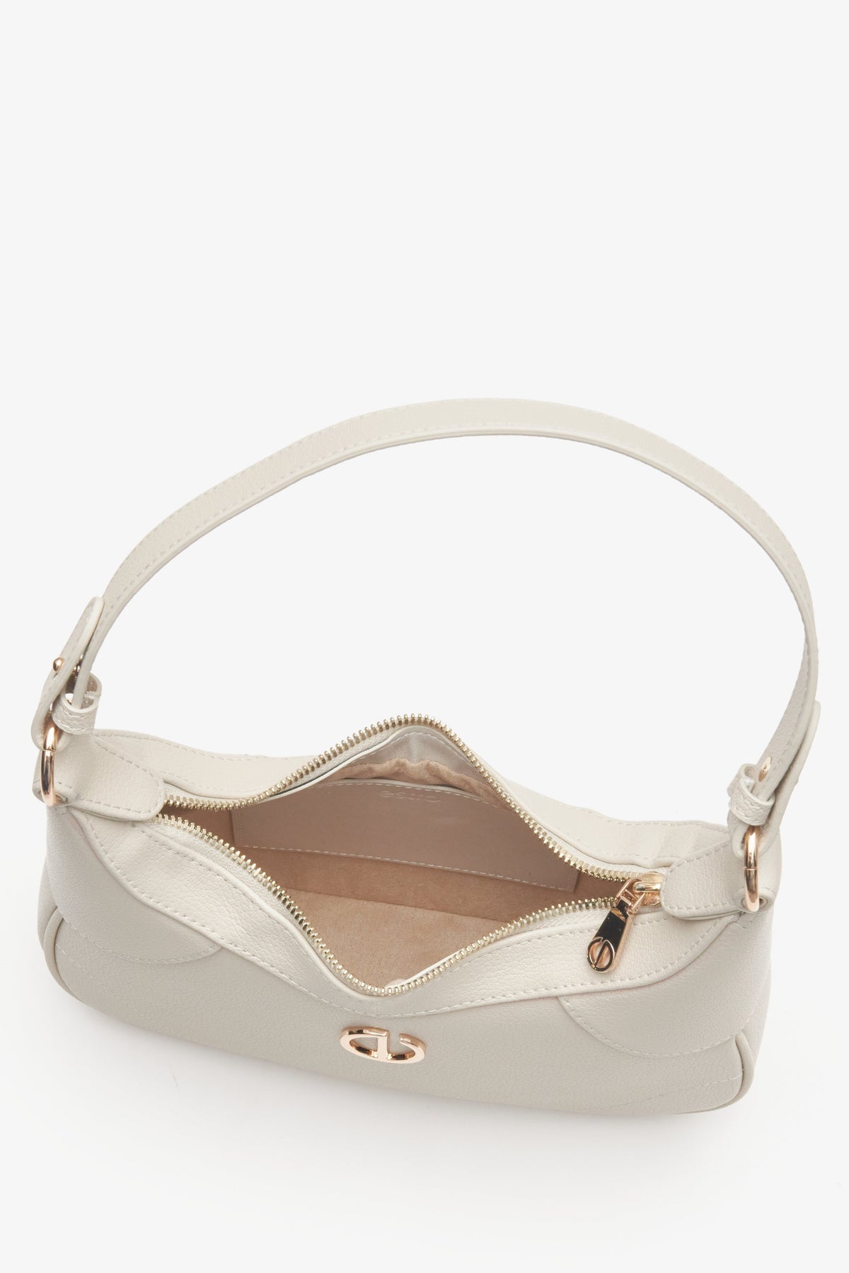 Elegant women's cream beige bag - a close-up on the main compartment.