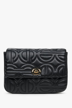 Women's small black shoulder bag with a gold chain.
