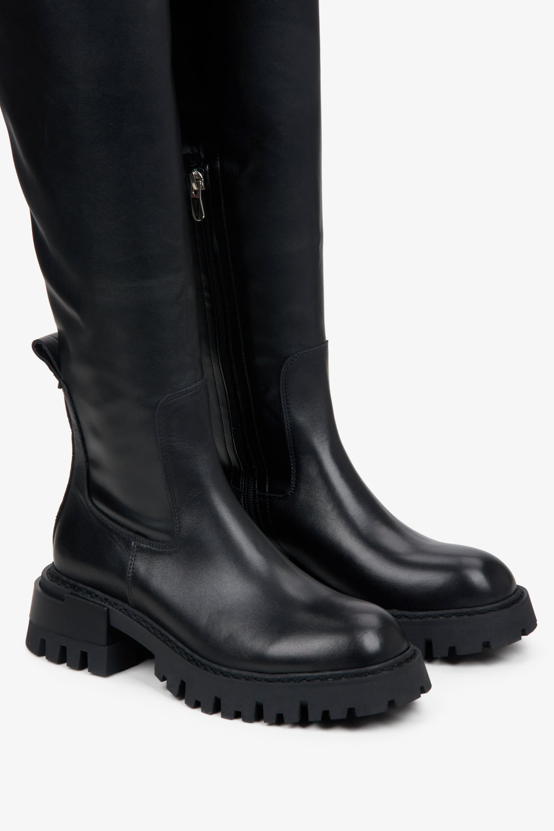 Women's black leather boots by Estro.