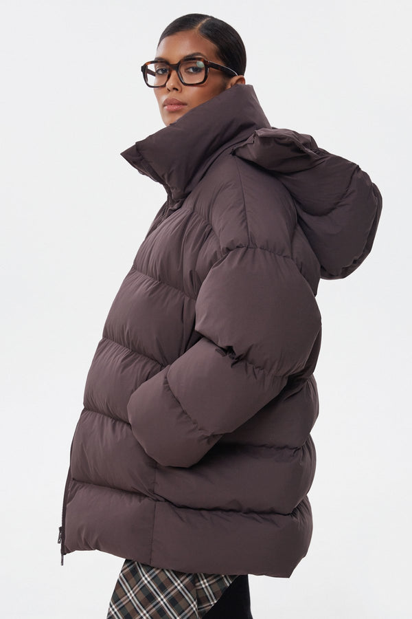 Women's dark brown puffer jacket Estro - side view.