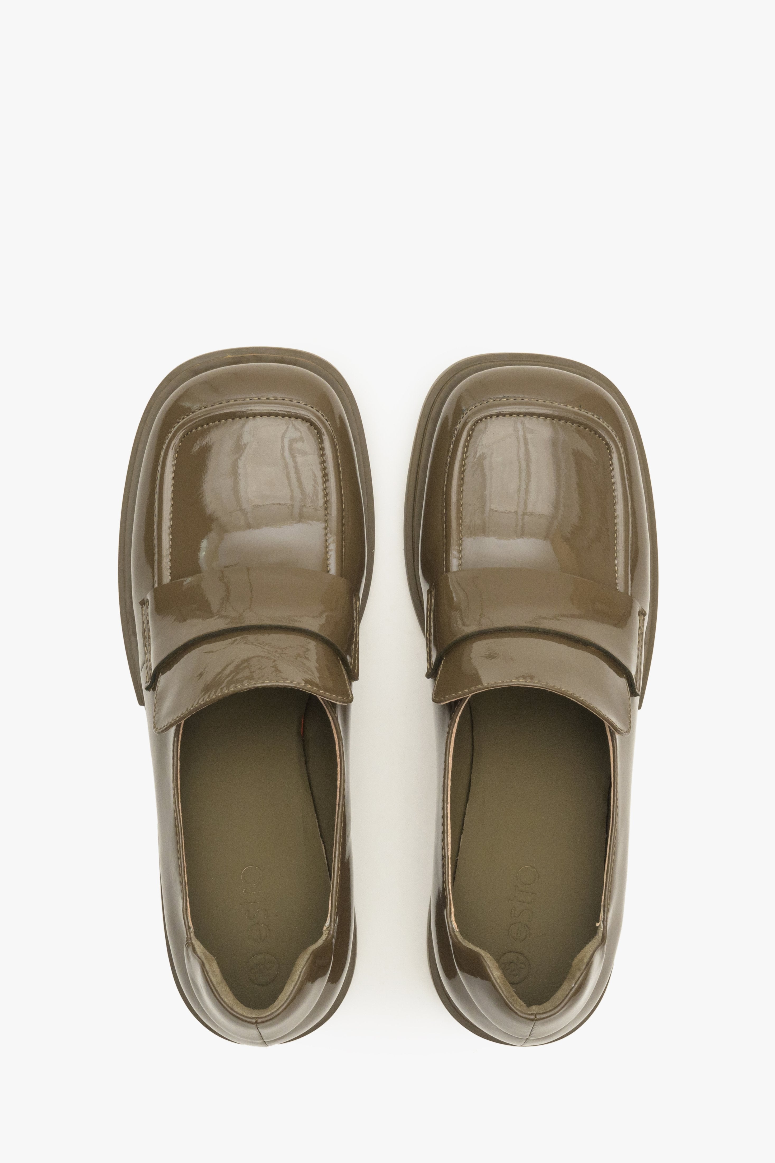 Women's leather, patent leather moccasins in dark green by Estro - top view presentation of the model.