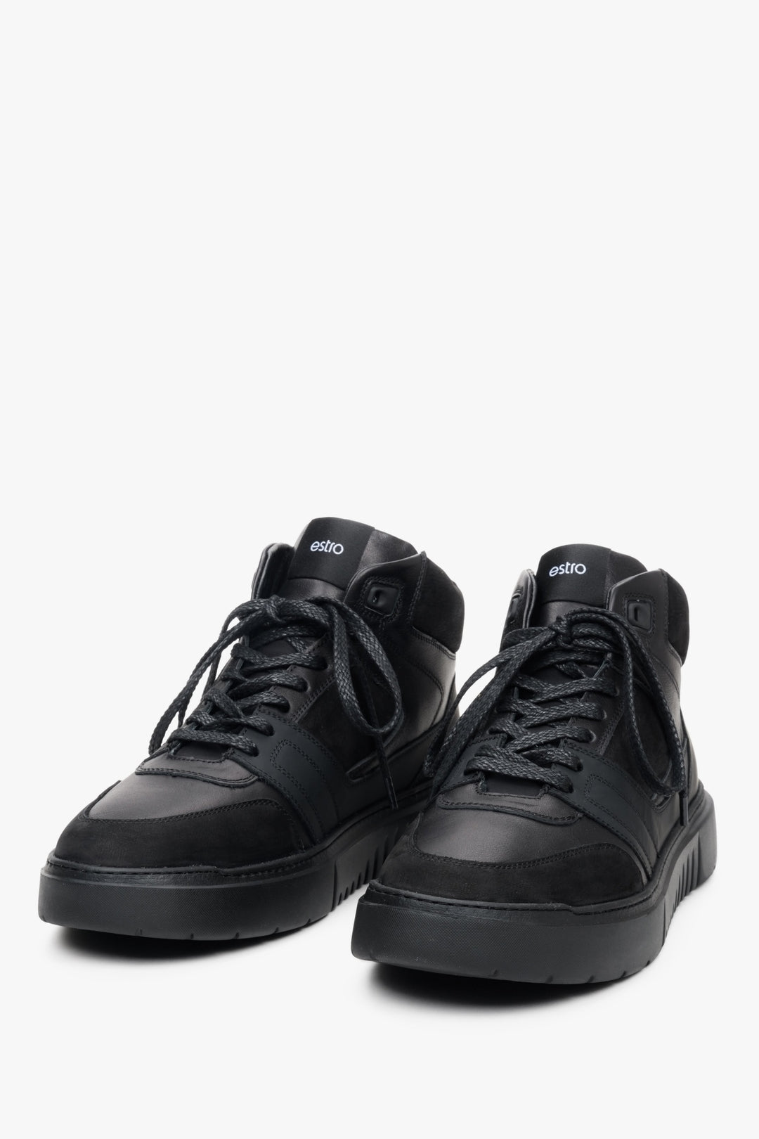 High-top men's sneakers by Estro in black, made from genuine leather and suede - front part of the shoe.