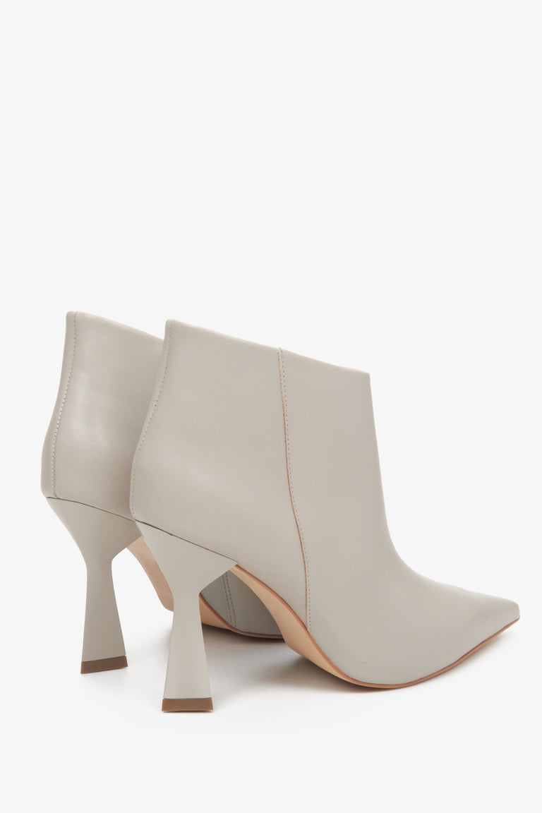 Women's light grey short leather ankle boots by Estro - close-up of the heel and side profile of the shoe.