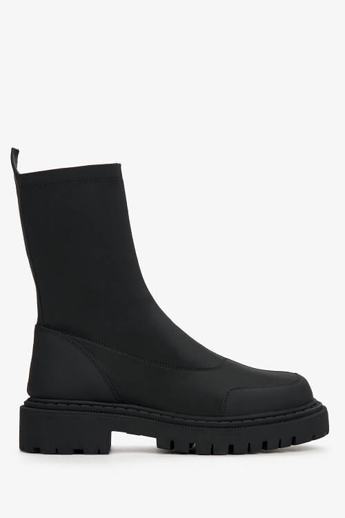 Black women's slip-on ankle boots with a flexible upper - shoe profile.