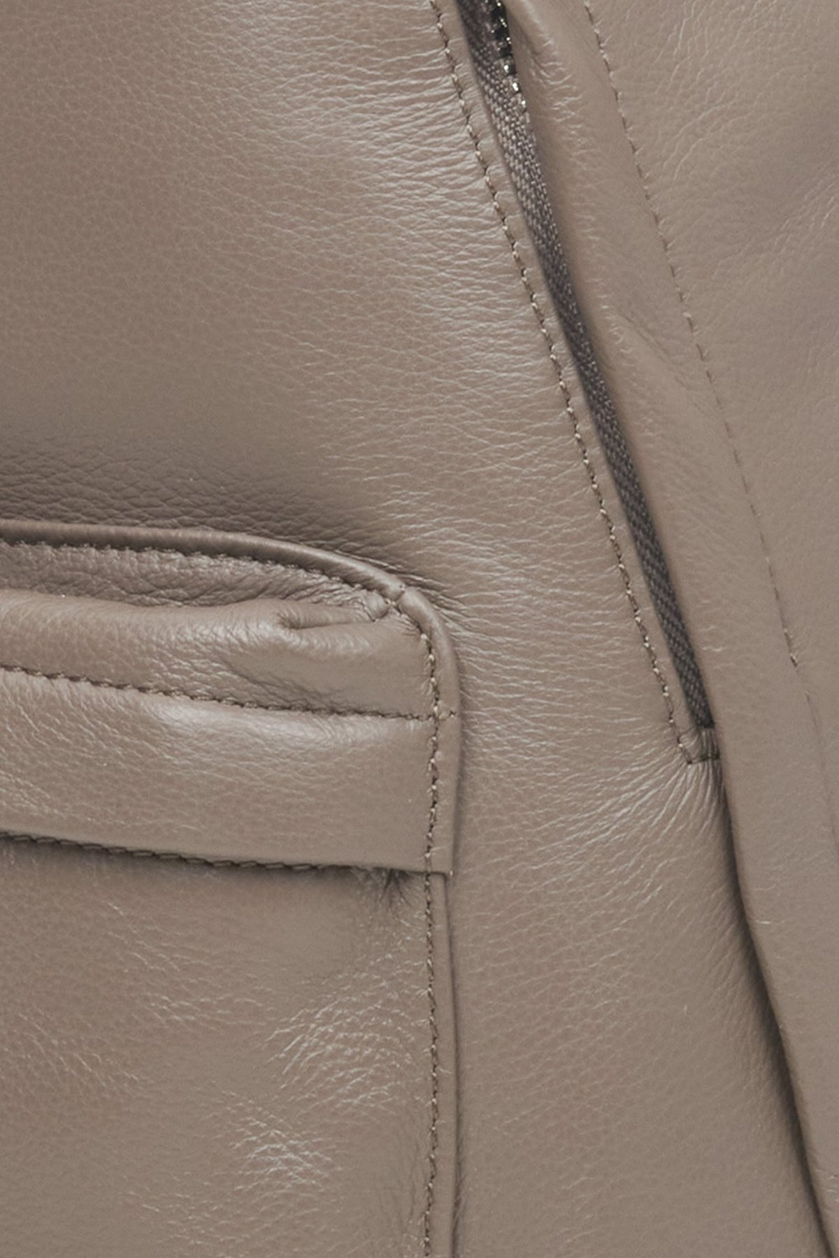 Big women's grey and brown backpack made of genuine leather by Estro - close-up of the details.