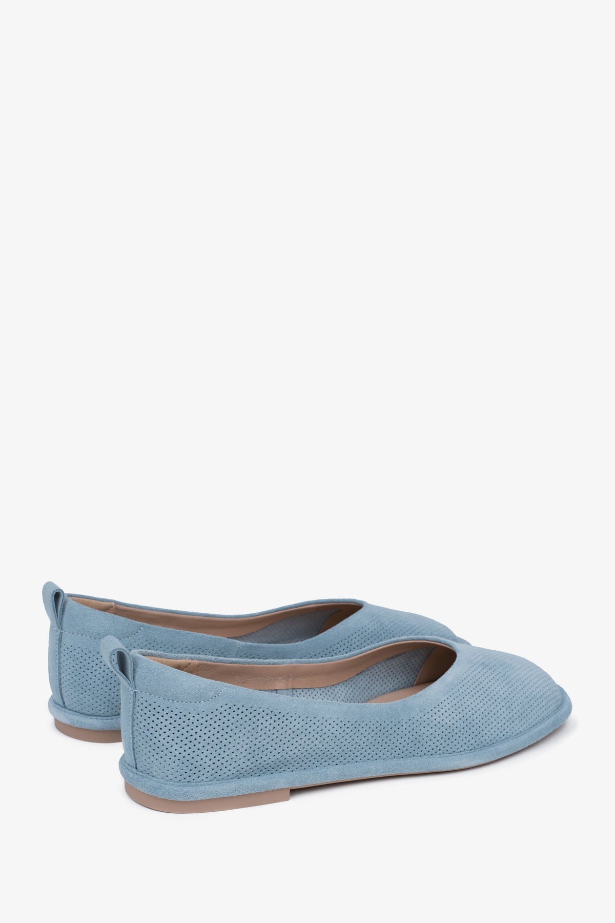 Blue women's ballet flats by Estro, made of perforated soft genuine velour – close-up of the heel counter.
