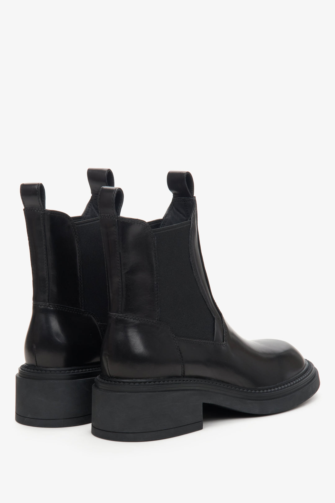 Women's black leather Chelsea boots - a close-up on shoes' heel counter