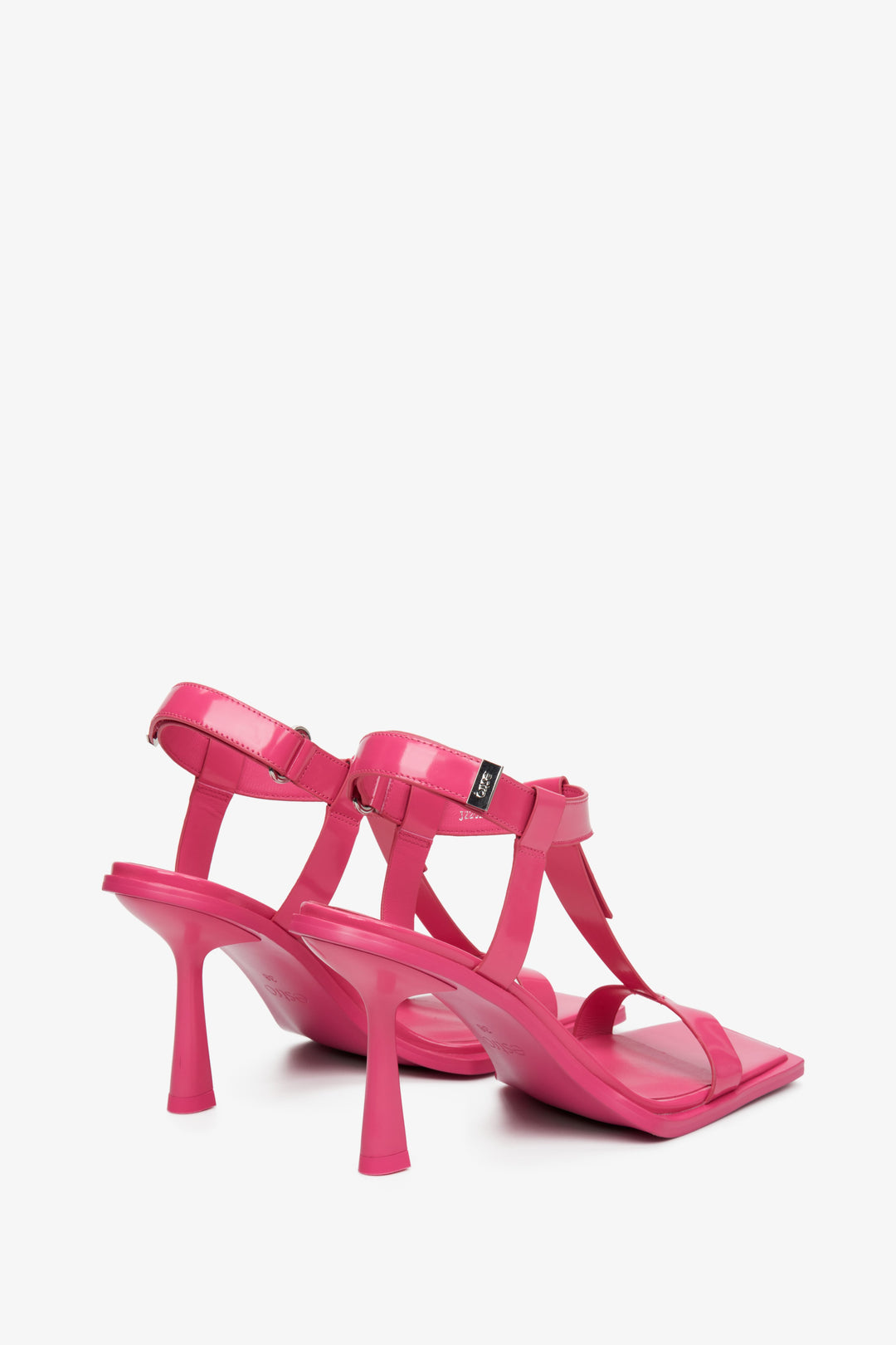 Pink women's heeled t-bar sandals, Estro brand.