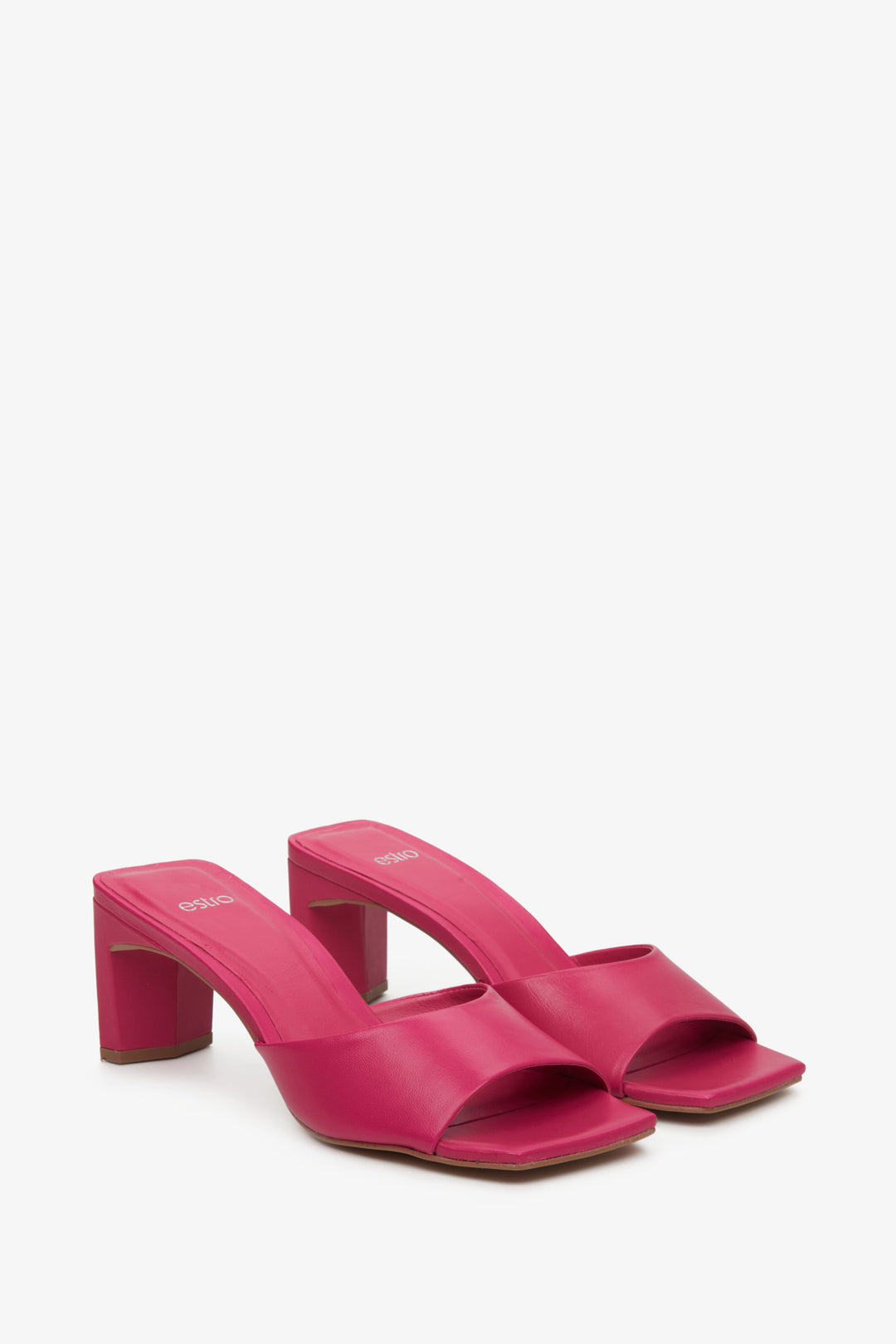 Women's pink leather mules with a sturdy block heel by Estro - close-up on the shoe's toe.