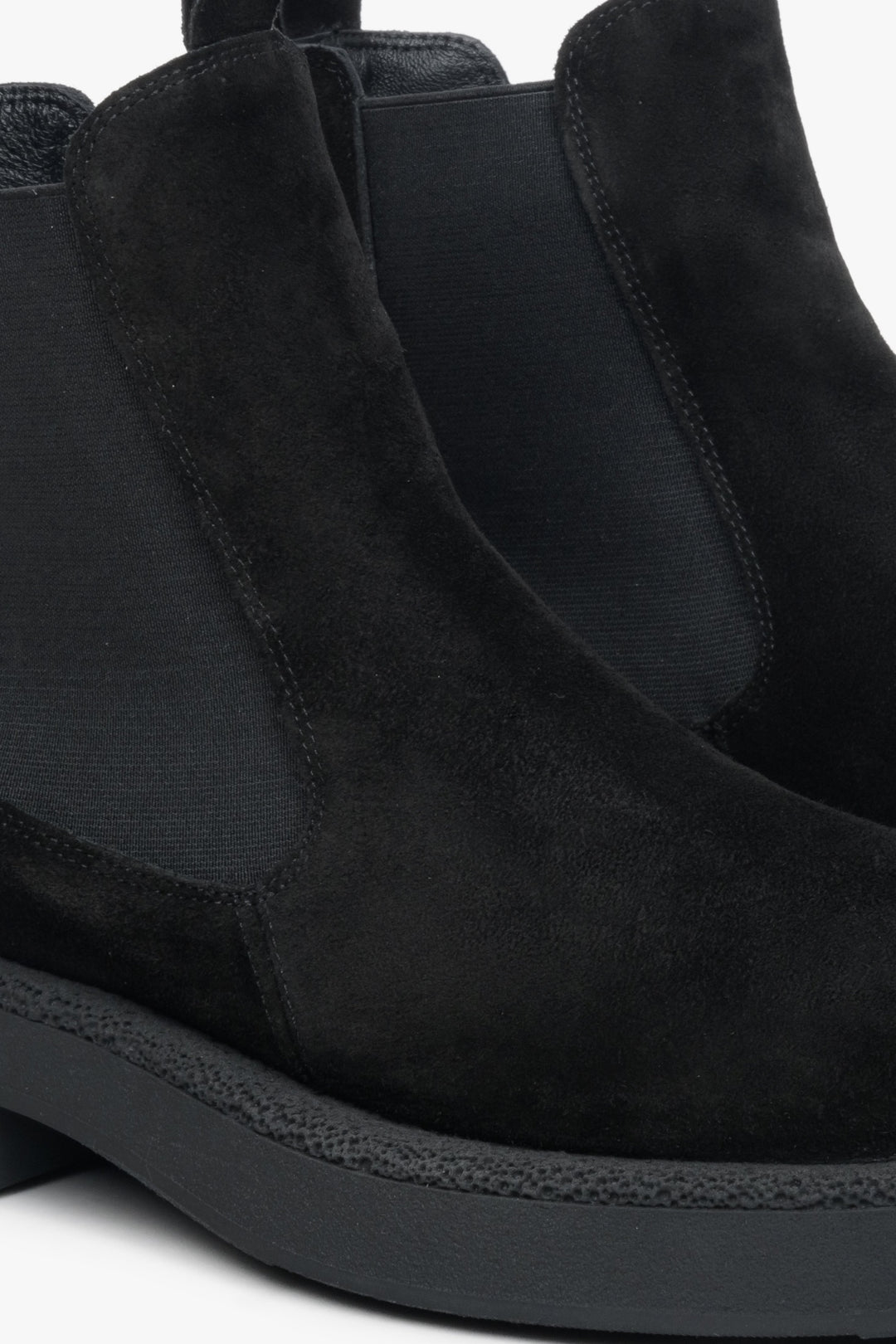 Black suede women's Chelsea boots - a close-up on details.
