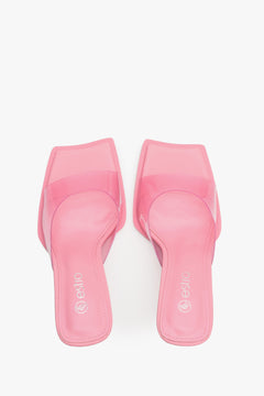 Womens's high-heeled sandals with a transparent strap and pink sole - top view model presentation.