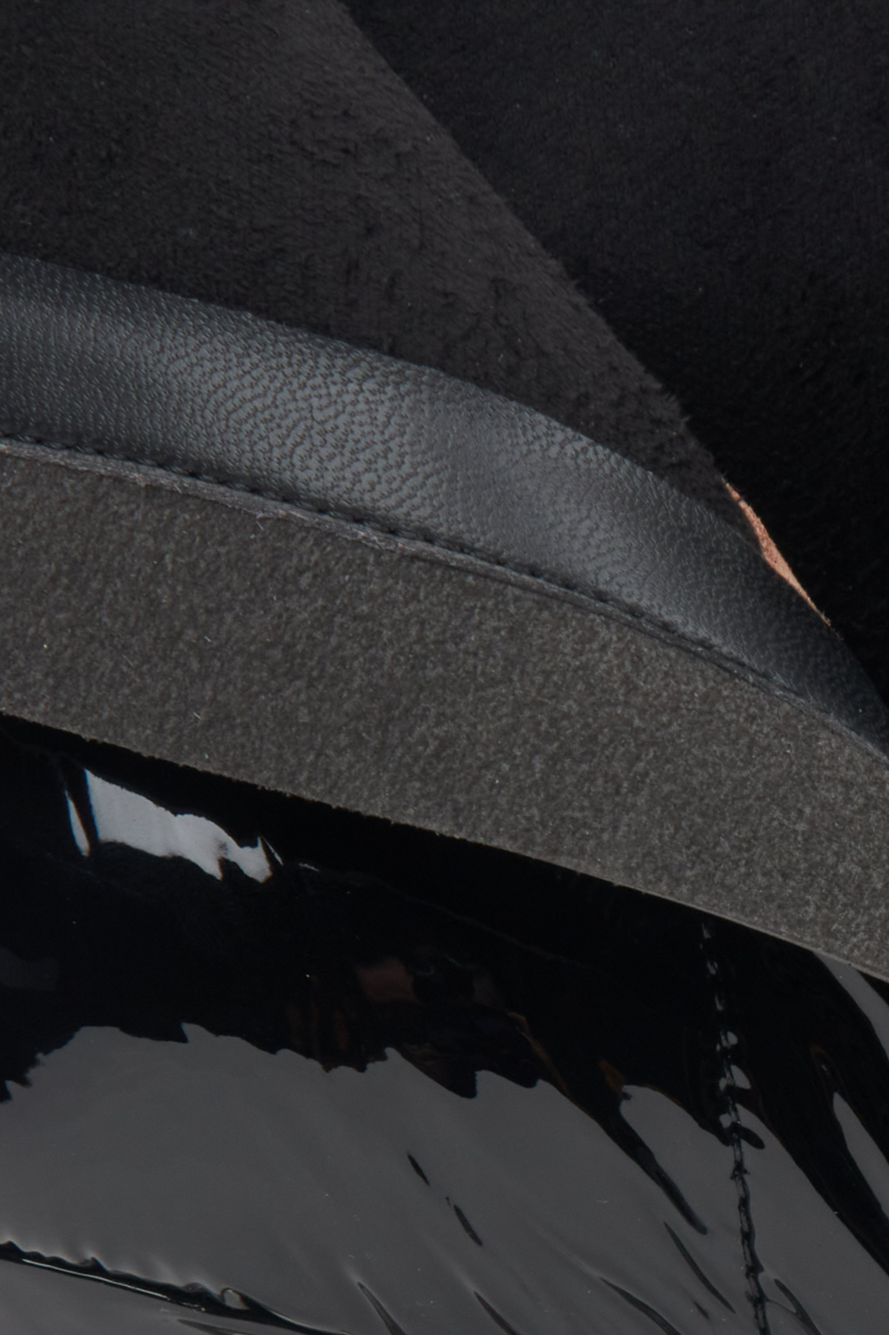 Black leather women's ankle boots on a stiletto heel by Estro – close-up of the interior of the shoe.